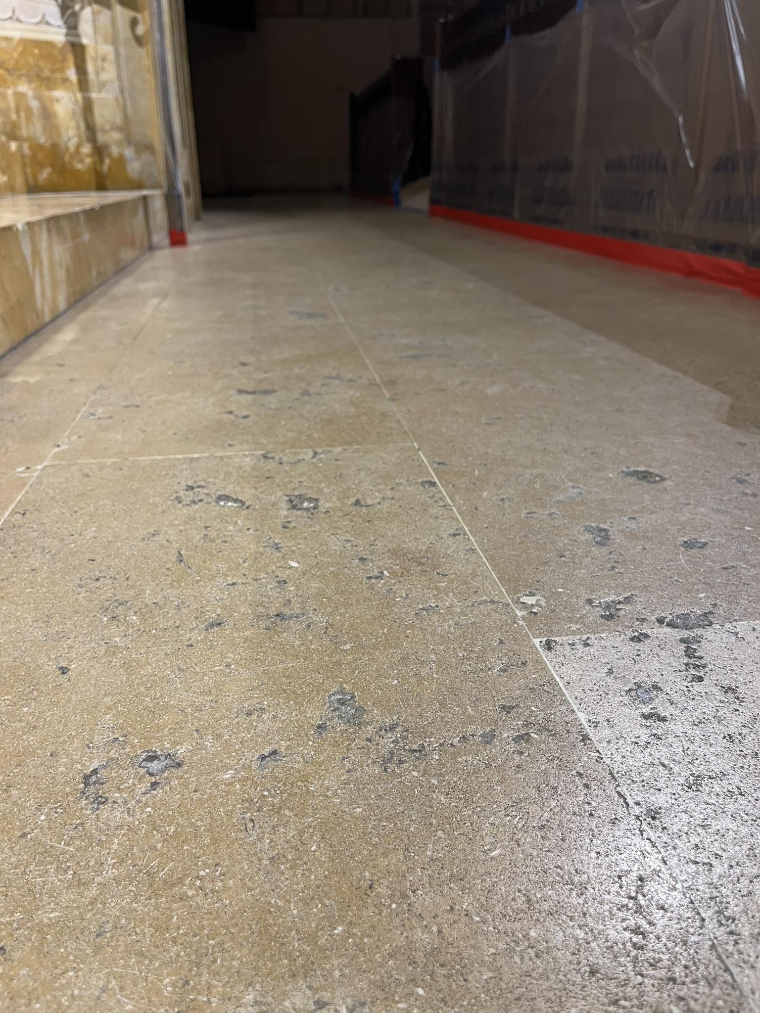Historic natural stone floor condition before restoration at Temple Emanu-El